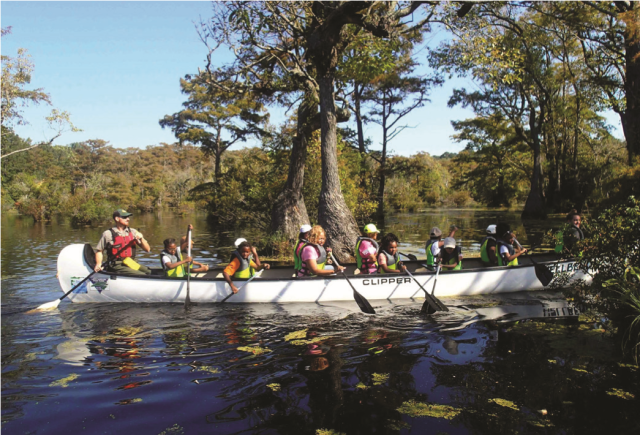 Paddlers on a Big Canoe