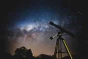 telescope with stars in the background