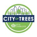 Green circle with illustration of a cityscape surrounded by trees. Text says "City of Trees"
