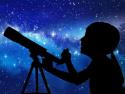 A child with a telescope