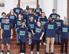A group of FUTURES storytellers posing with their matching t-shirts